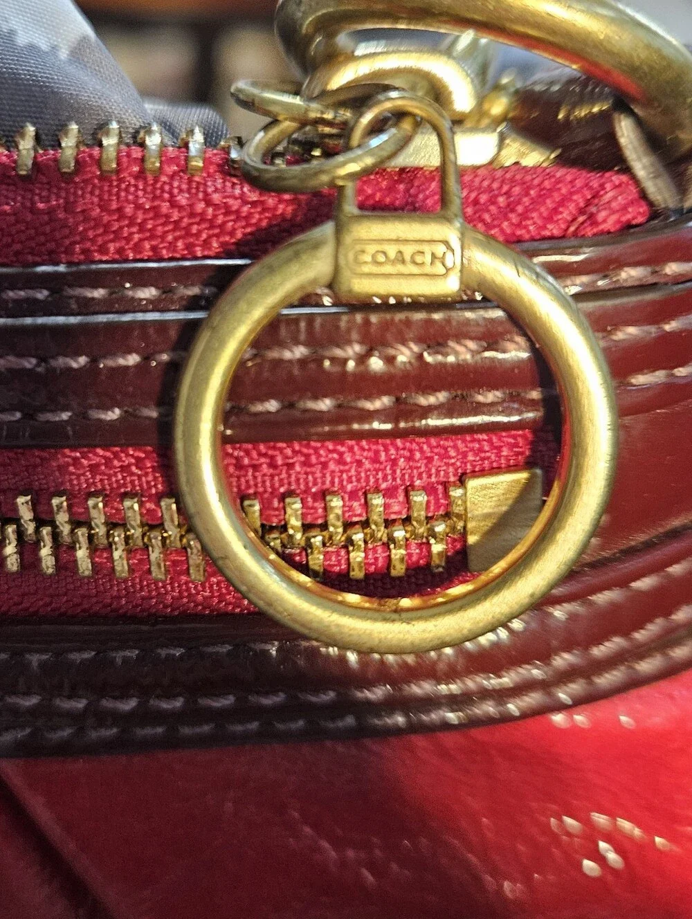 Coach Poppy Red Patent Wristlet with Brass Accents, Minor Callouts, Clean Inside